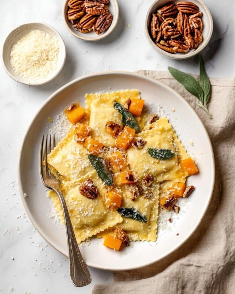 Pumpkin Ravioli with Sage Brown Butter, Pecans, and Parmesan Recipe